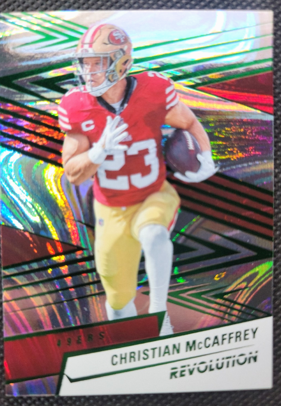 2025 Panini Revolution Christian McCaffrey #2 Green Swirl Holo /199